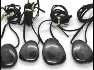 Shungite drilled pendants with leather cords