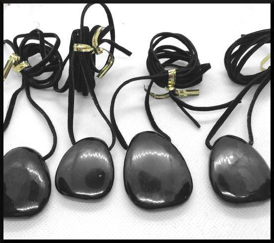 Shungite drilled pendants with leather cords