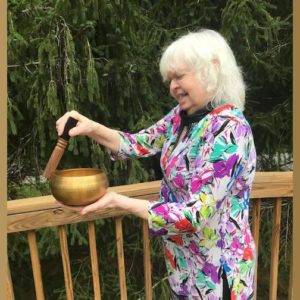 Mountain Valley Jill playing hand hammered singing bowl